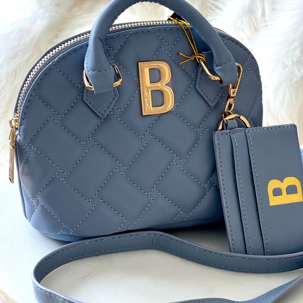 Bebe signature dome crossbody blue slate color